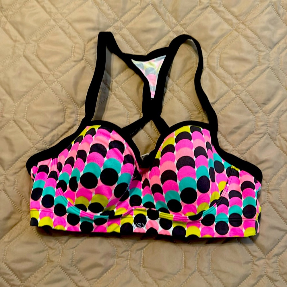 Victoria’s Secret sports bra. Cross back. 3 hook eye closure.
